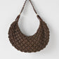 Vintage brown faux leather woven purse with braided strap.