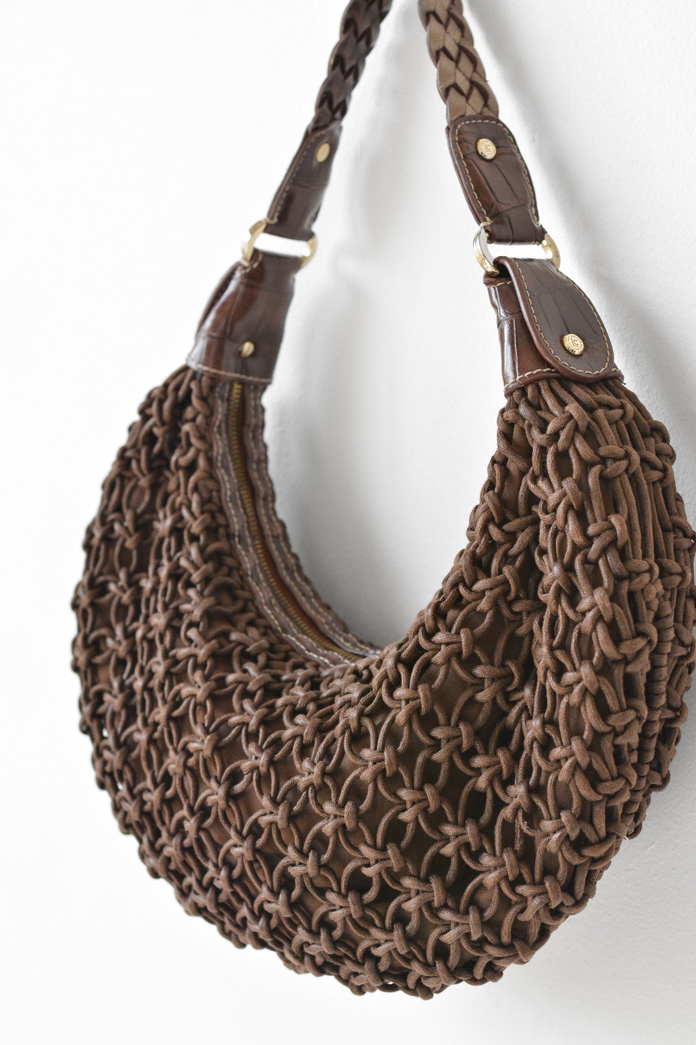Vintage brown faux leather woven purse.