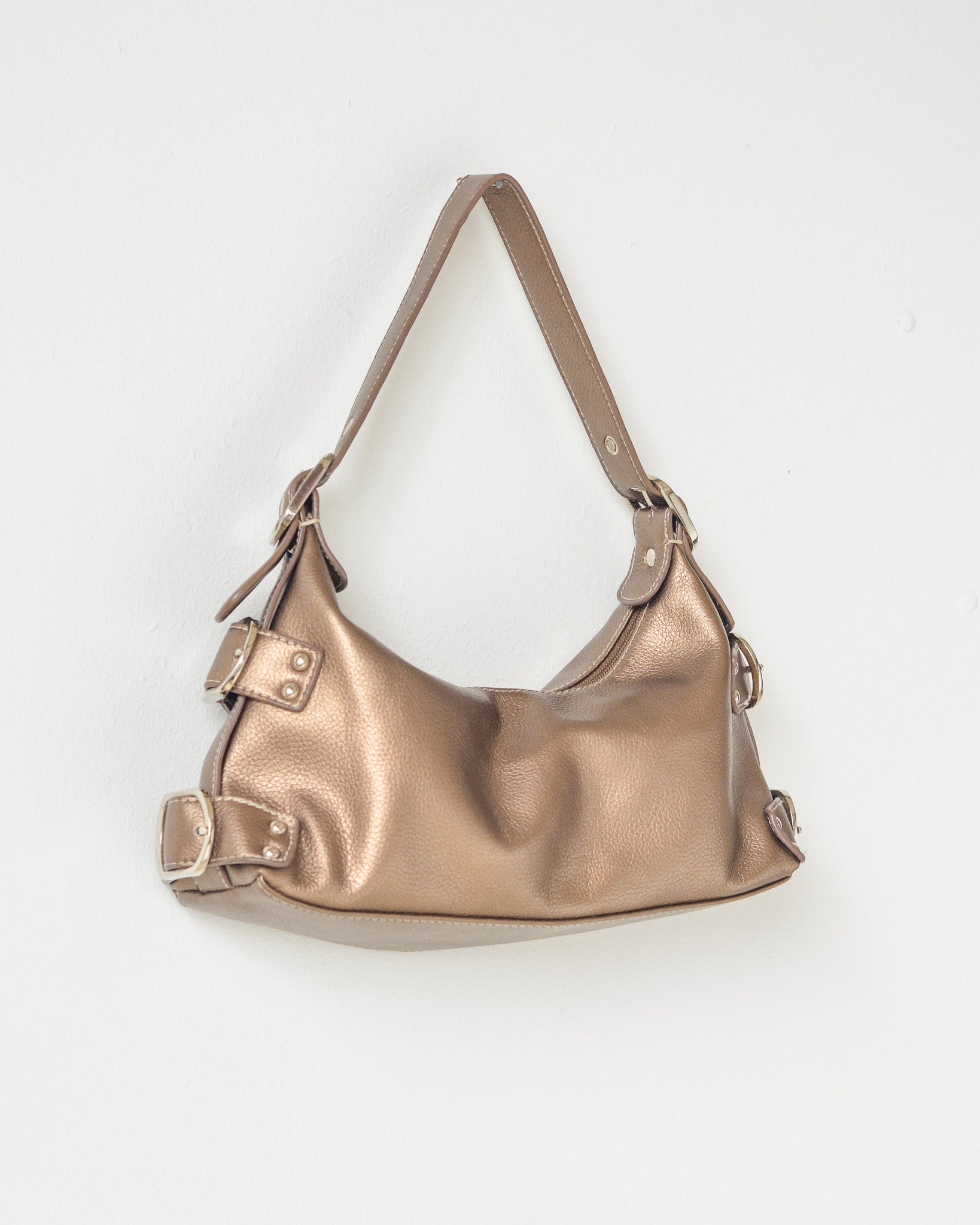 Vintage bronze faux leather buckle purse.